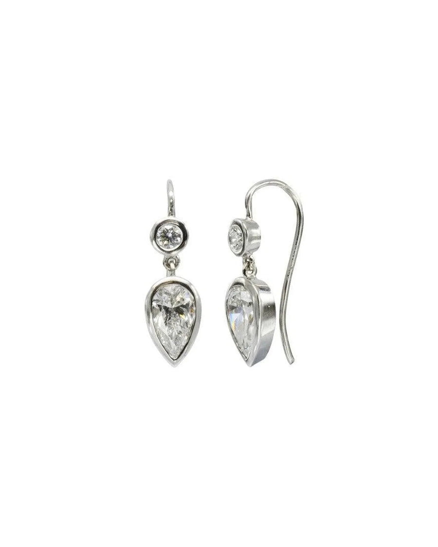 White gold drop earrings with round and pear shaped diamonds.
