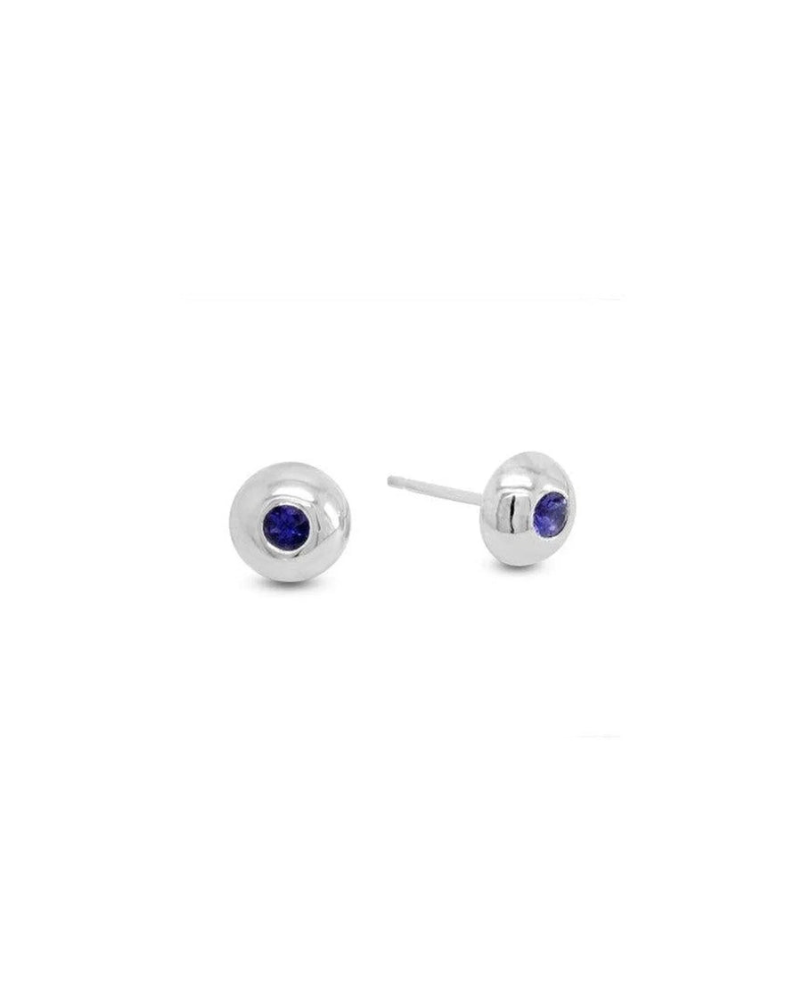 Pebble-shaped silver stud earrings with round tanzanite stones, minimalist design