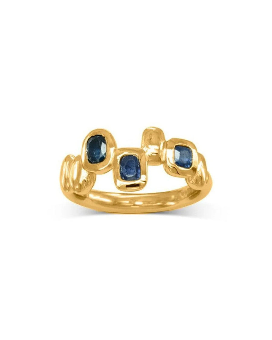 Gold half eternity ring with organic design, featuring blue sapphire gemstones