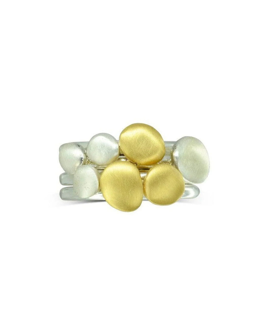 Matte gold and silver pebble stacking ring set with organic, textured shapes
