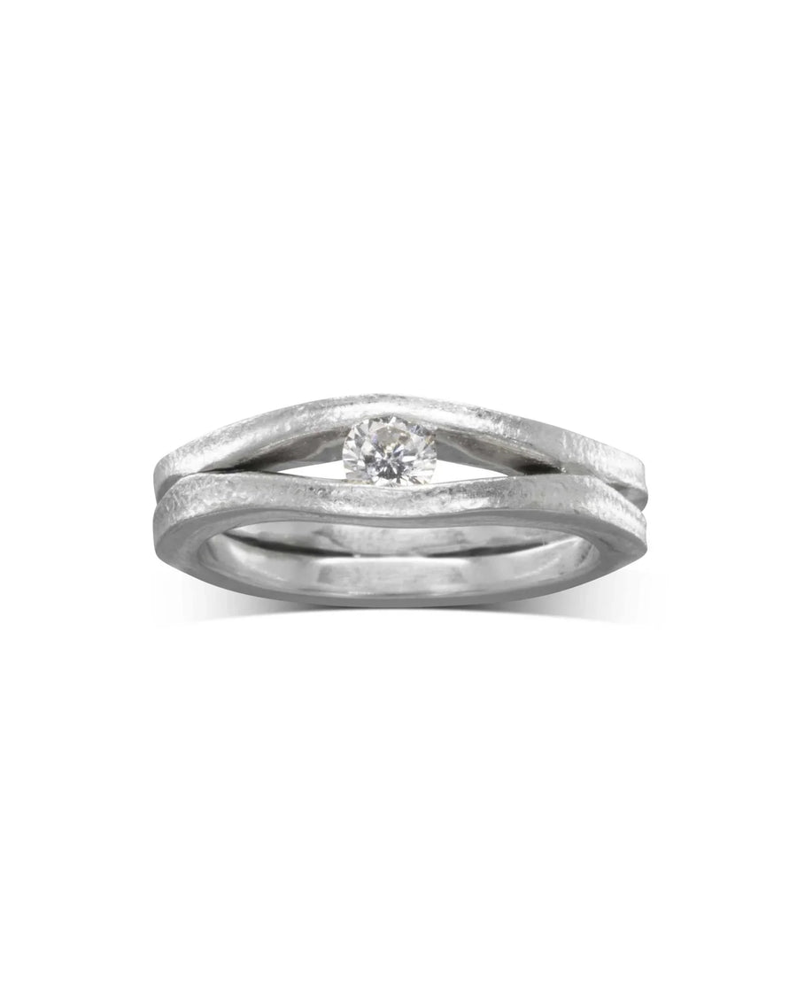 Platinum diamond trap solitaire engagement ring.