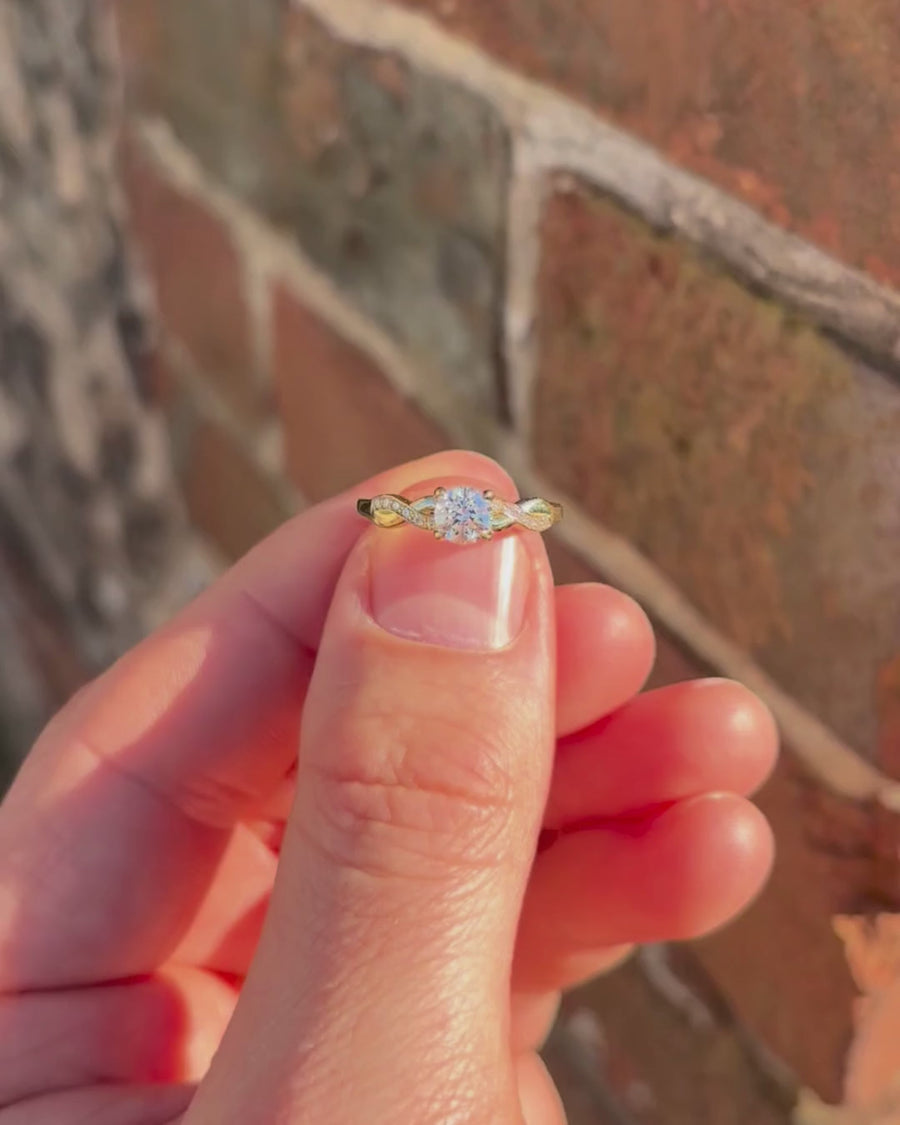 0.53ct Natural Round Cut Twist Claw Engagement Ring