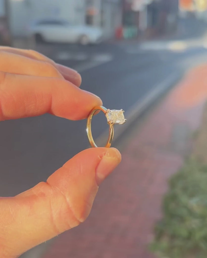 Cushion cut diamond engagement ring