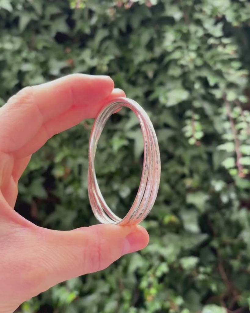  hammered triple bangle being rotated