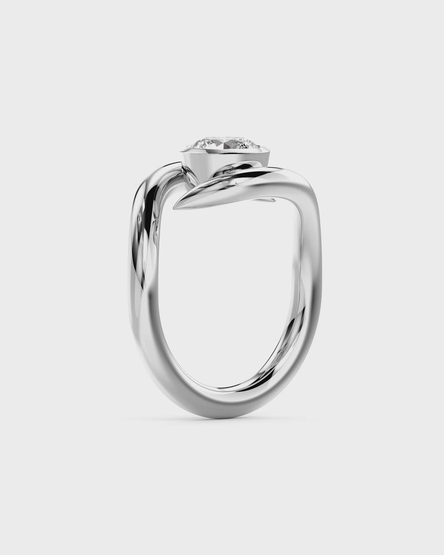 Round Cut Spiky Engagement Ring