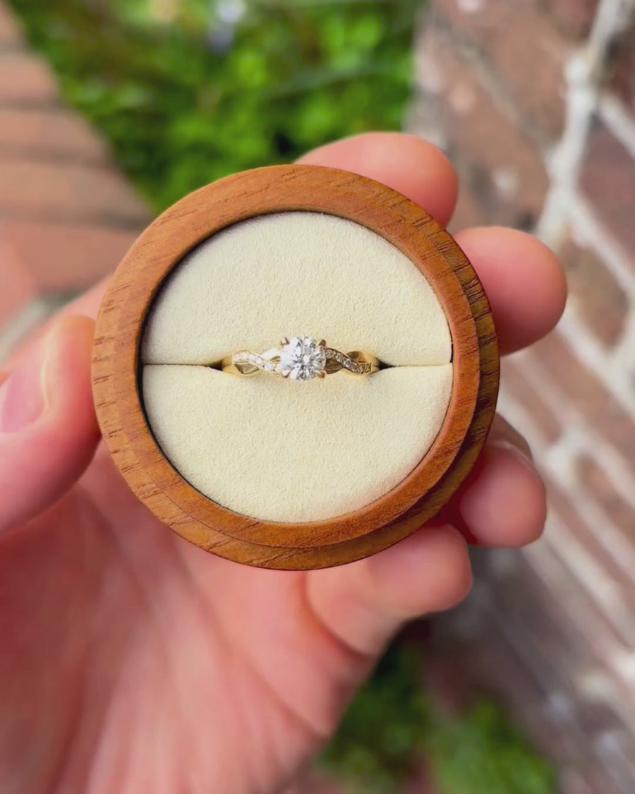 0.53ct Natural Round Cut Twist Claw Engagement Ring