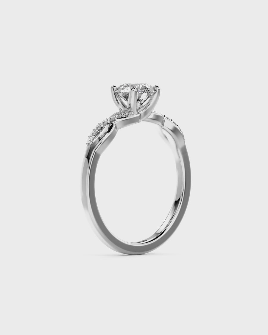 Round Cut Twist Claw Engagement Ring