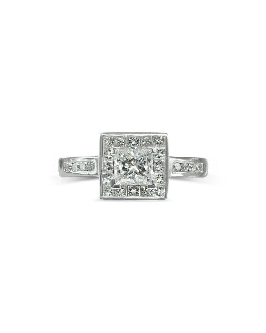 White gold ring with a princess cut diamond center stone and diamond halo.