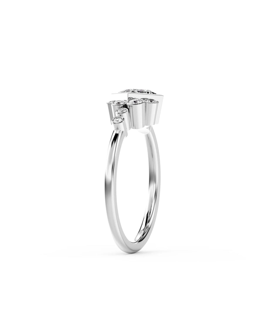 Silver princess cut rocky water bubbles engagement ring with round diamonds.
