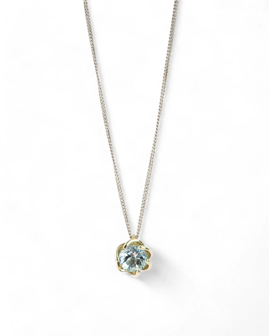 White gold necklace with a round aquamarine gemstone pendant on a simple chain