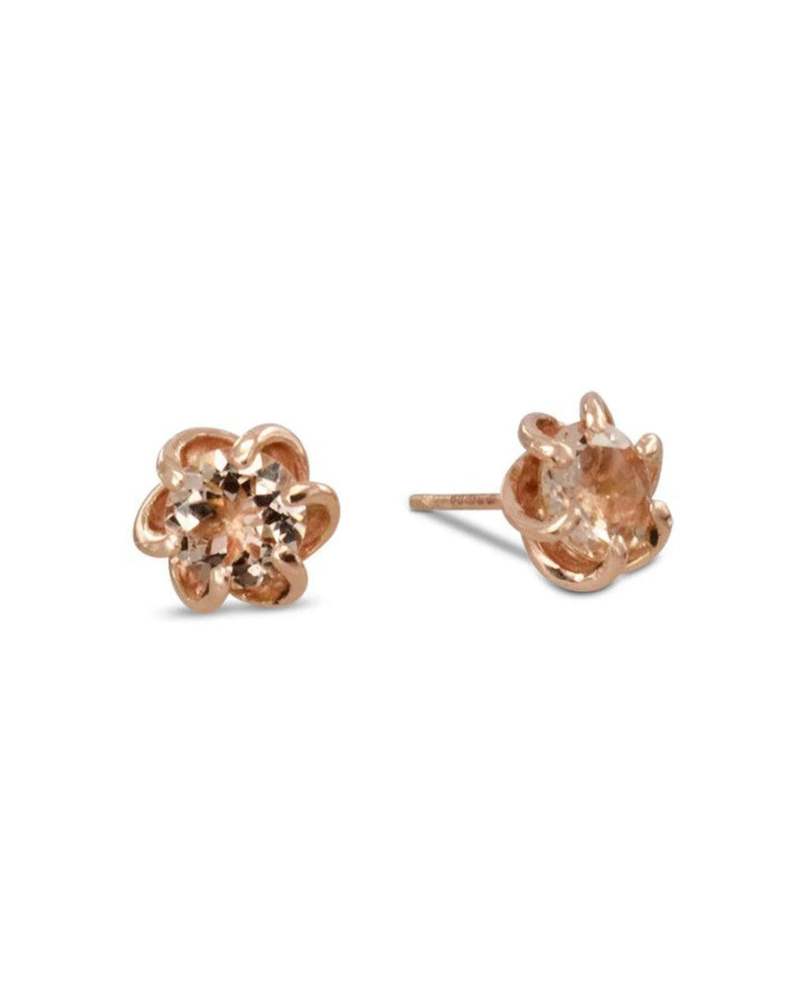 Rose gold revolved claw stud earrings with round peach gemstones.