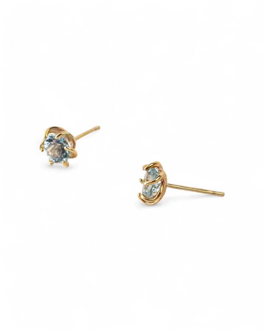 9ct yellow gold stud earrings with vivid aquamarine gemstones in a revolved claw setting.