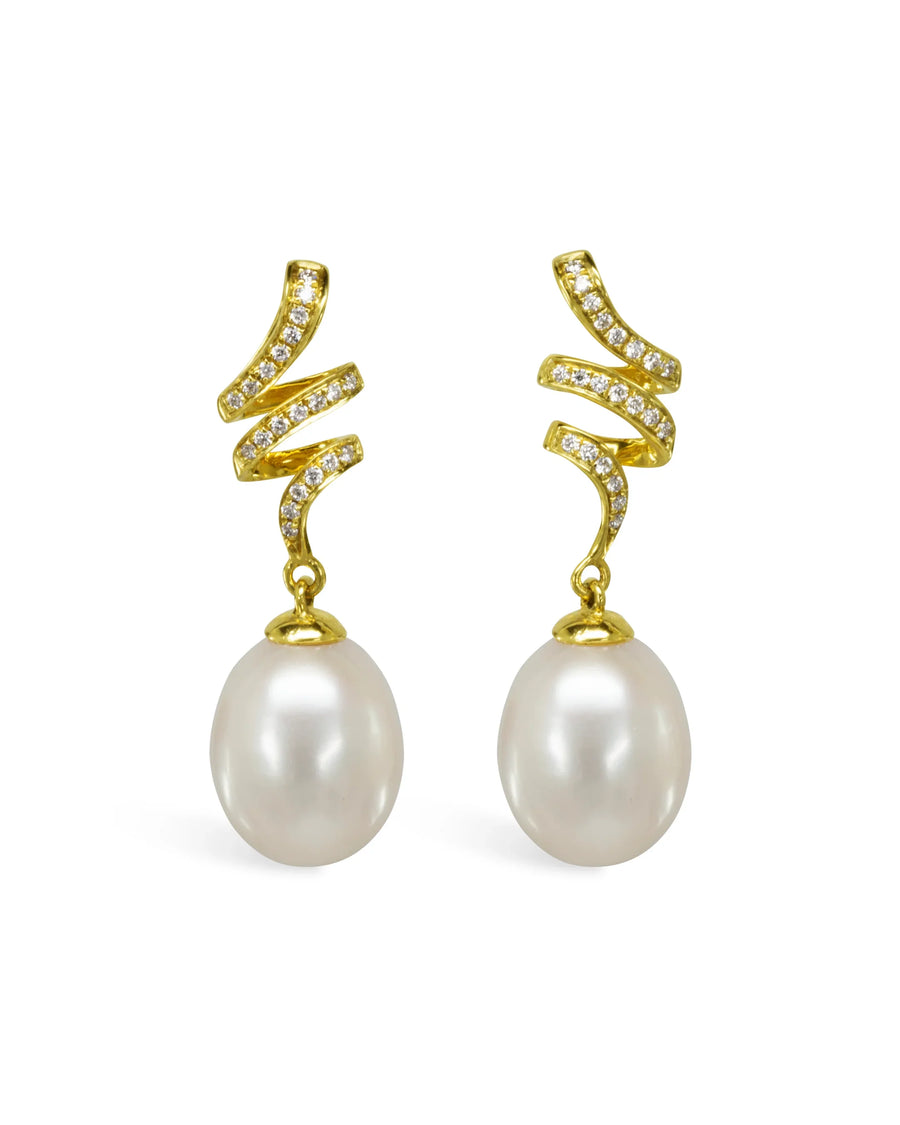 Gold swirl drop earrings with pave diamonds and large white pearls