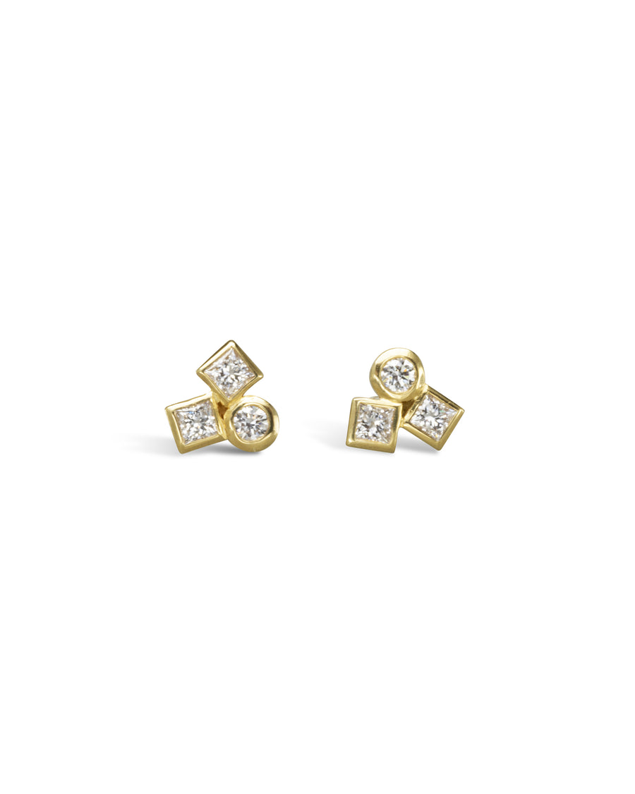 Gold stud earrings with round and square diamonds.