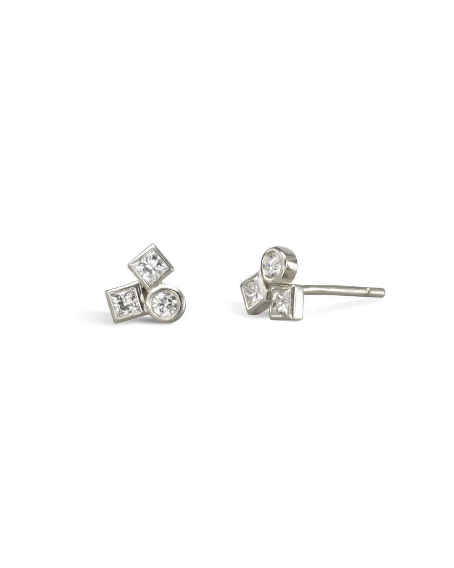 9ct white gold stud earrings with three clear diamonds in round and square settings.