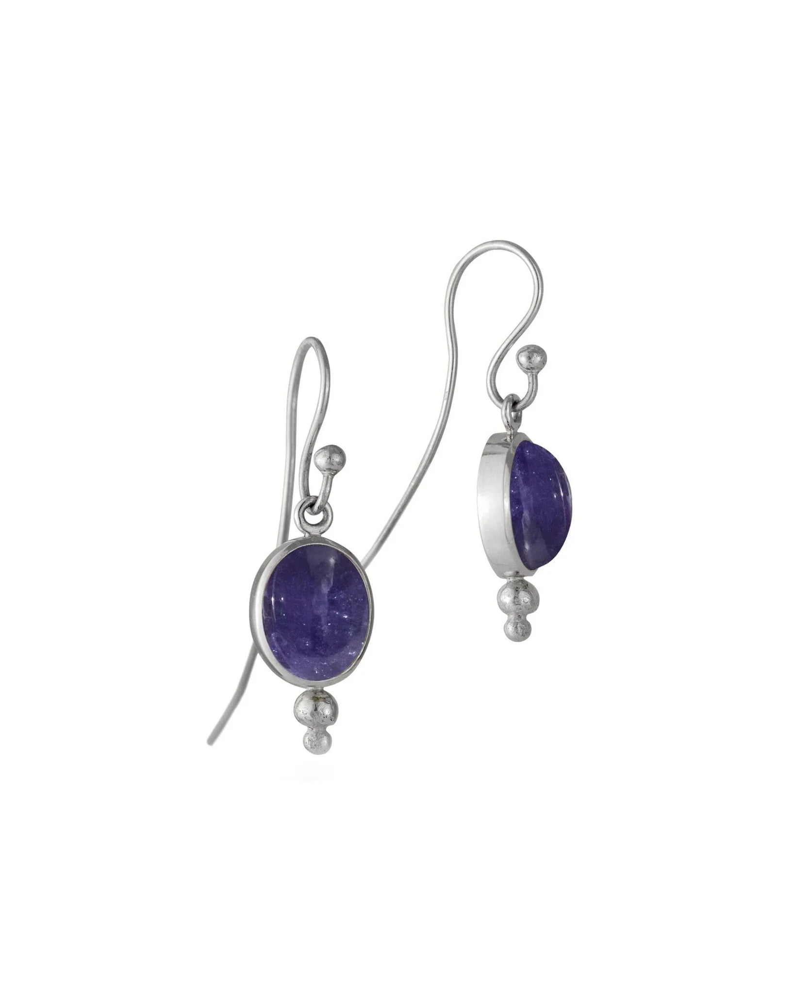 Silver drop earrings with oval purple tourmaline cabochons and small silver beads.