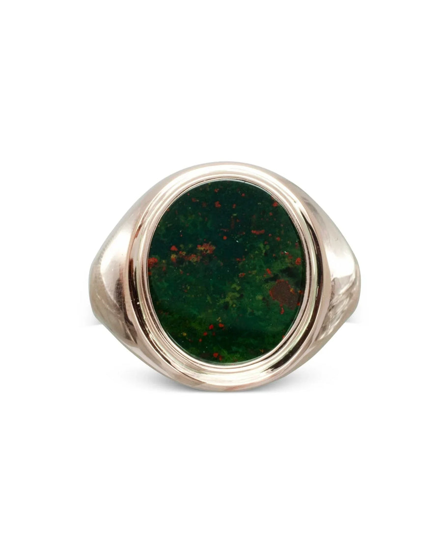 Rose gold signet ring featuring an oval bloodstone with green and red flecks.