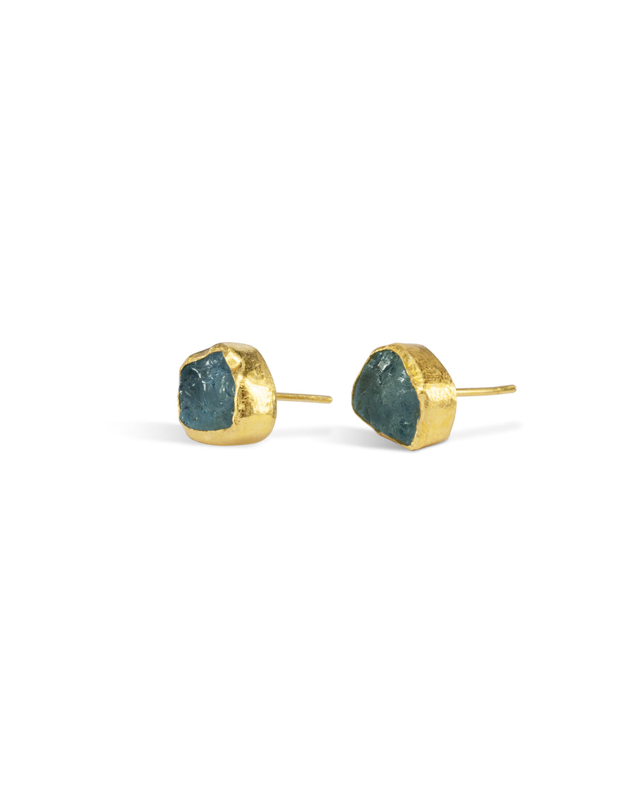 Gold stud earrings with rough cut blue-green gemstone chunks.