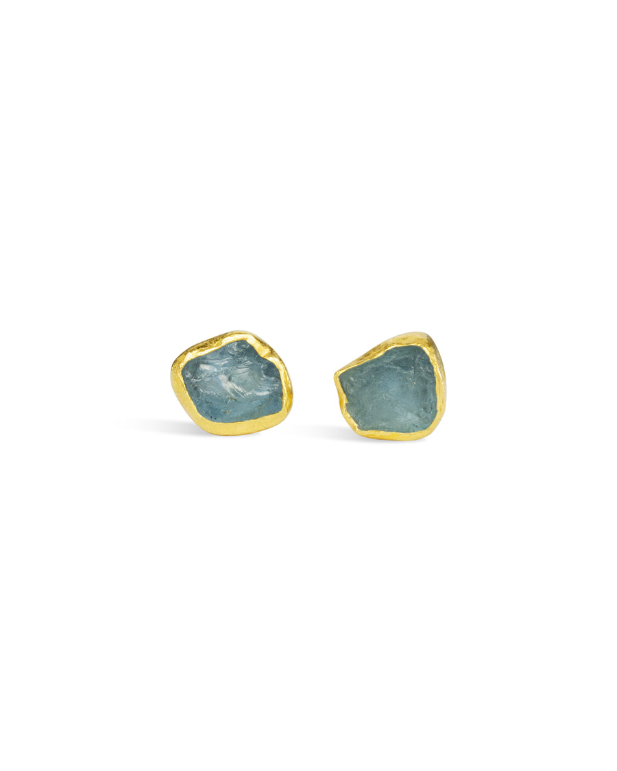 Gold rough cut blue gemstone chunk stud earrings.