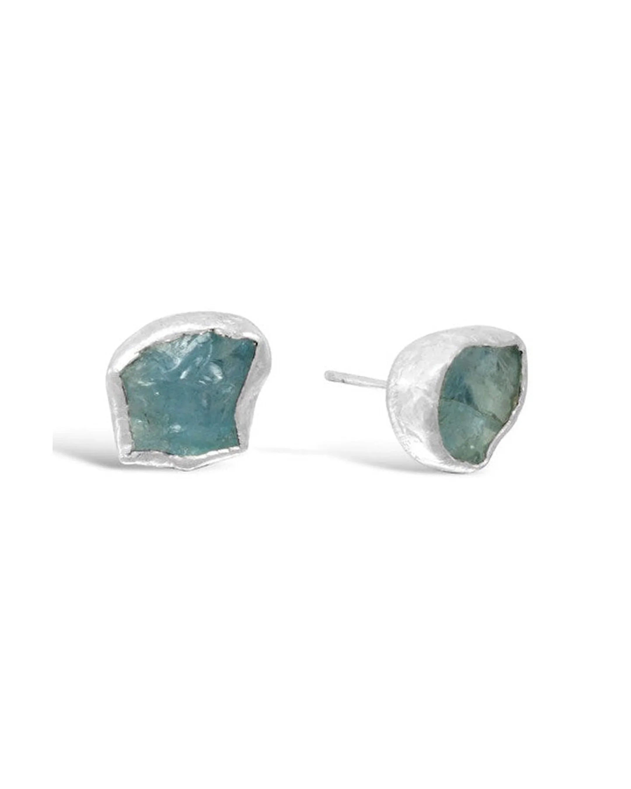 Handmade silver stud earrings with rough aquamarine gemstones, organic and textured style