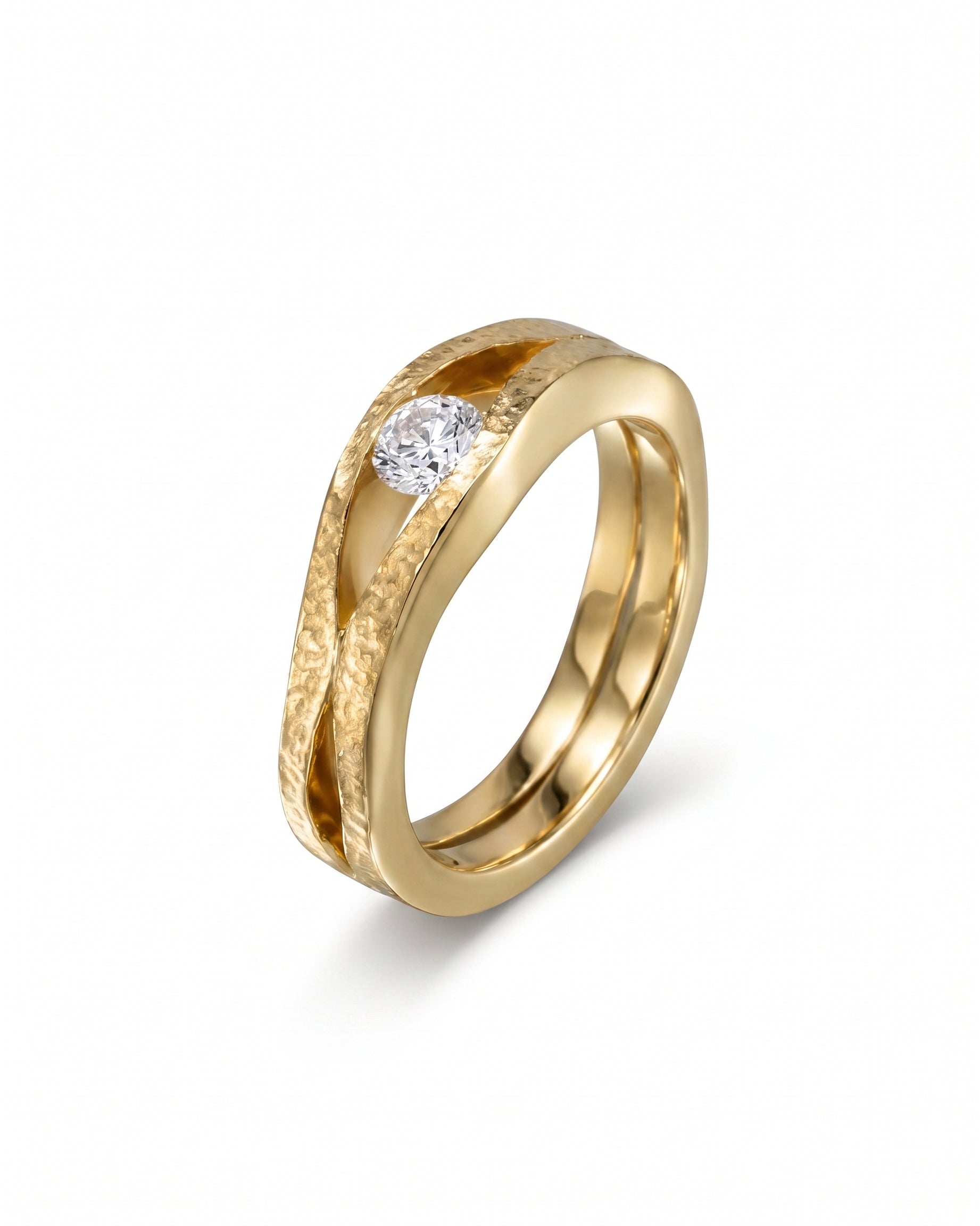Gold rough hammered diamond trap solitaire engagement ring.