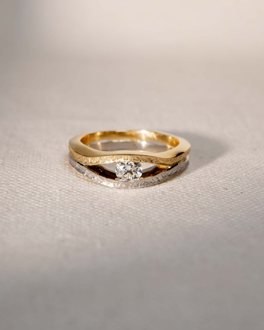 9ct white and yellow gold rough hammered diamond solitaire engagement ring.