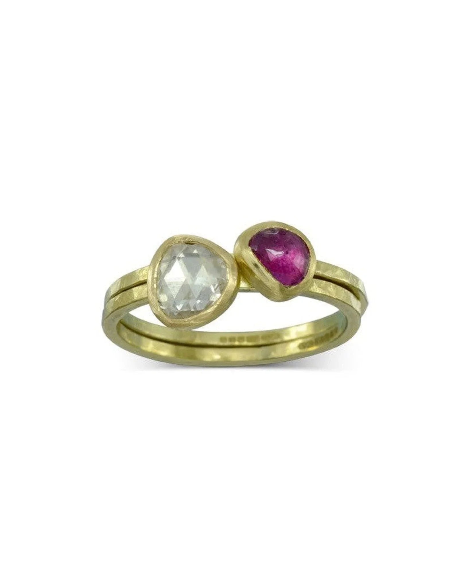 Handmade gold stacking rings with rough hammered texture, featuring a rose cut diamond and a ruby.