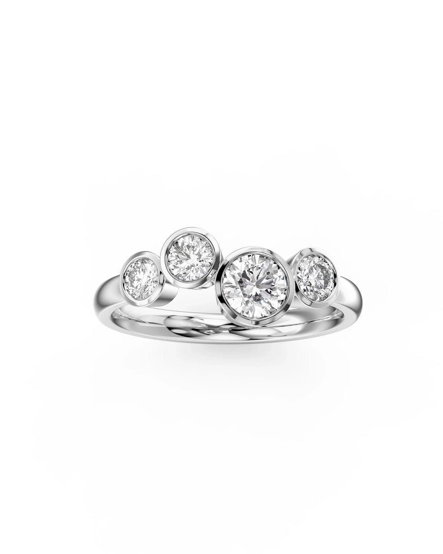Silver ring with four round cut diamonds in a bubble design.