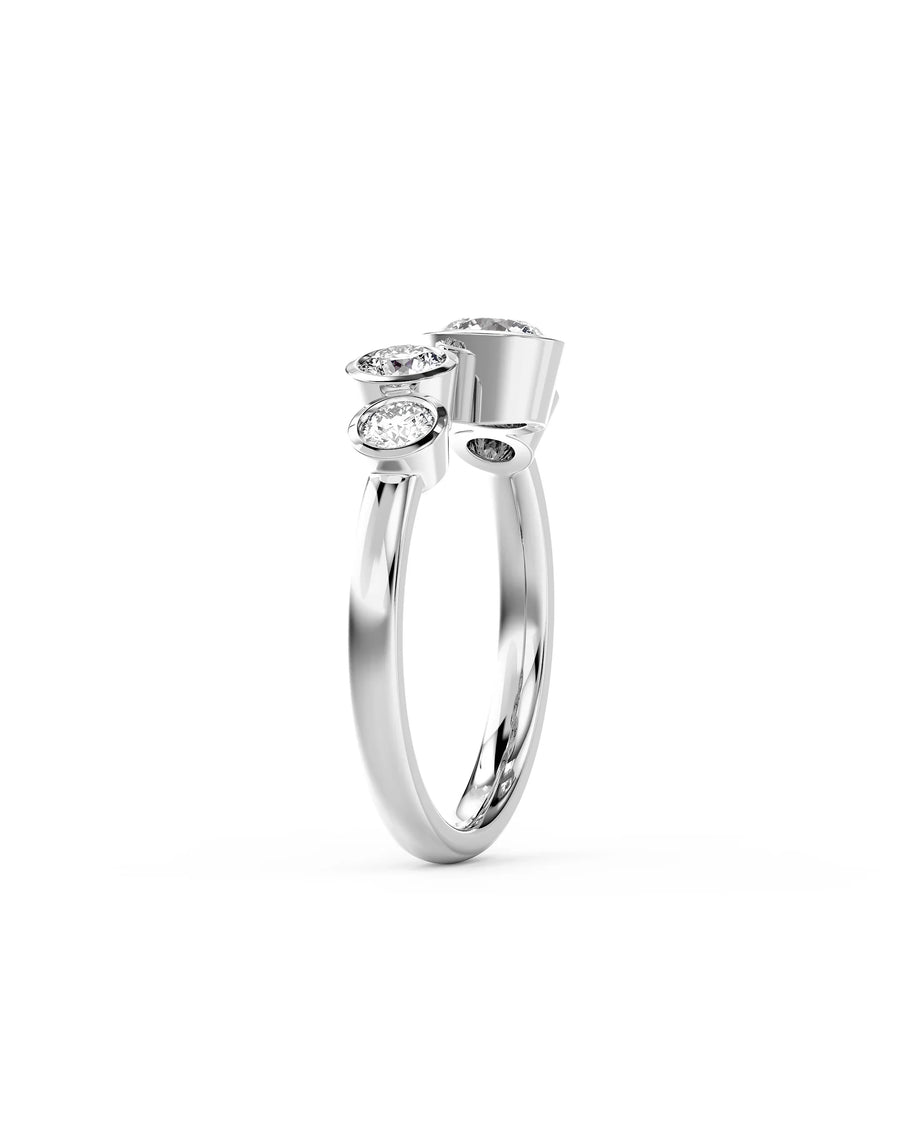 Silver round cut four diamond water bubbles engagement ring.