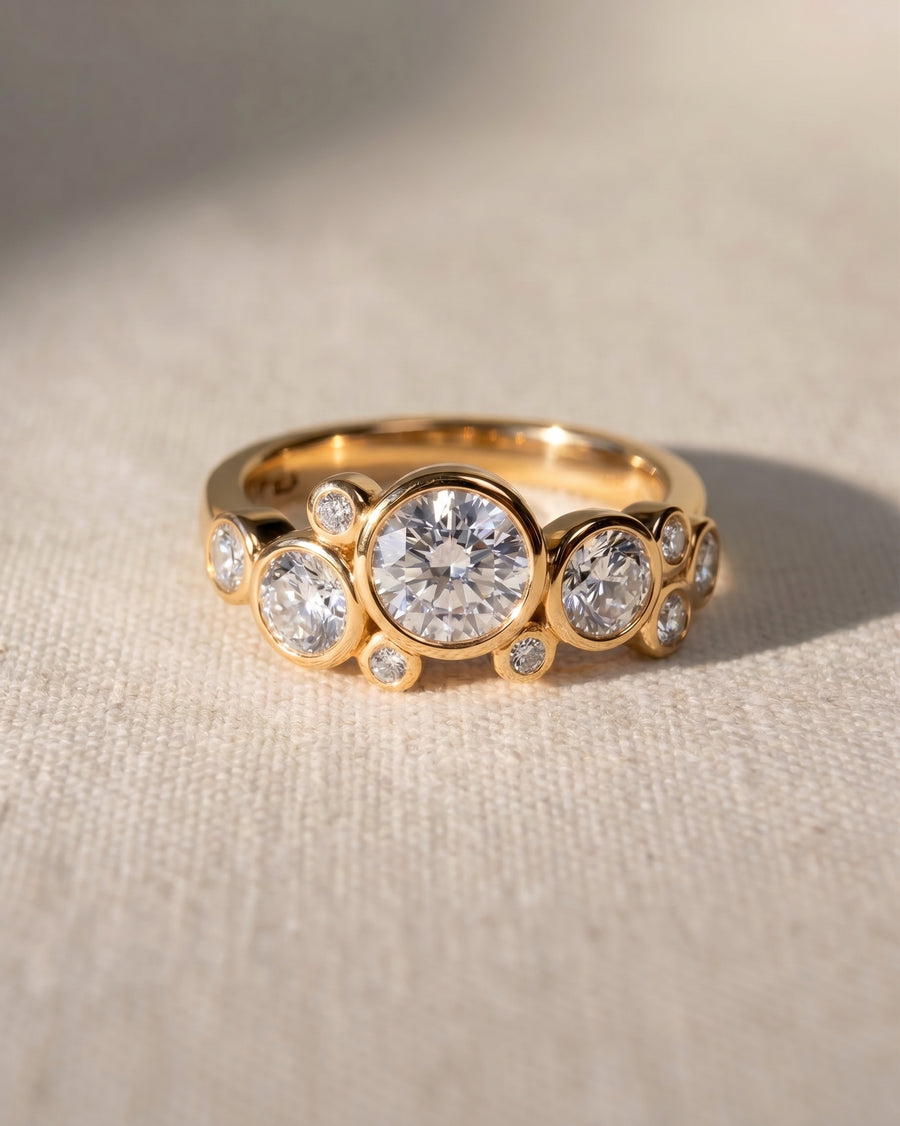 18ct yellow gold engagement ring with round lab grown diamonds in a water bubbles design.