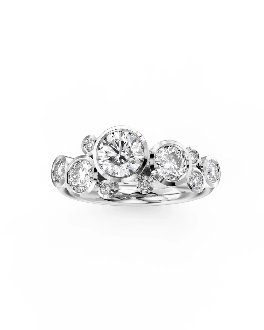 Silver ring with round cut diamonds in a bubble design.