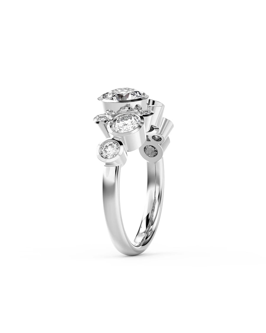 Silver ring with round cut diamonds in a large water bubbles design.