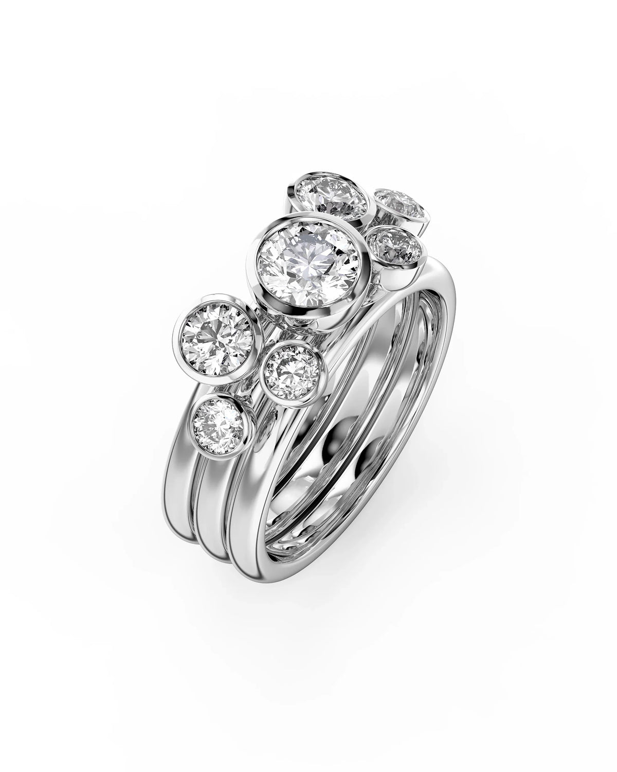Silver stacking rings with multiple round cut diamonds.