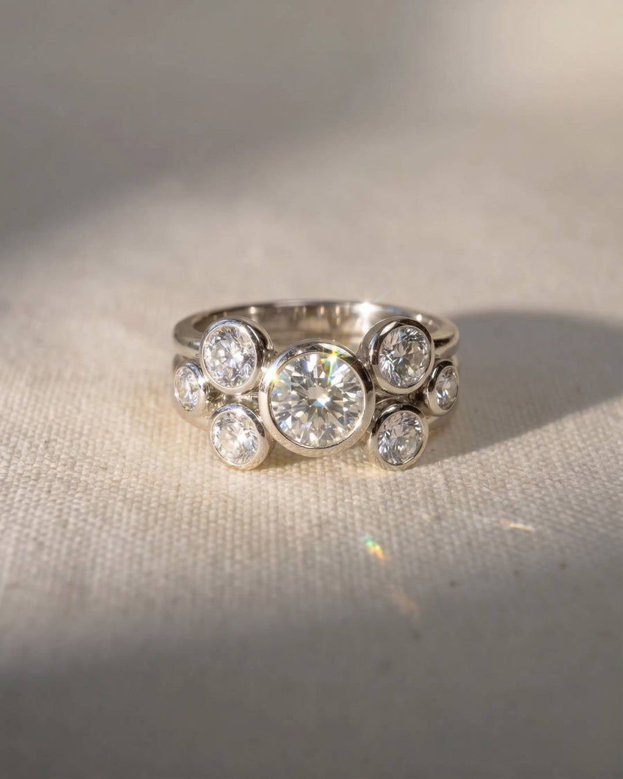 Platinum round cut stacking engagement ring with lab grown diamonds.