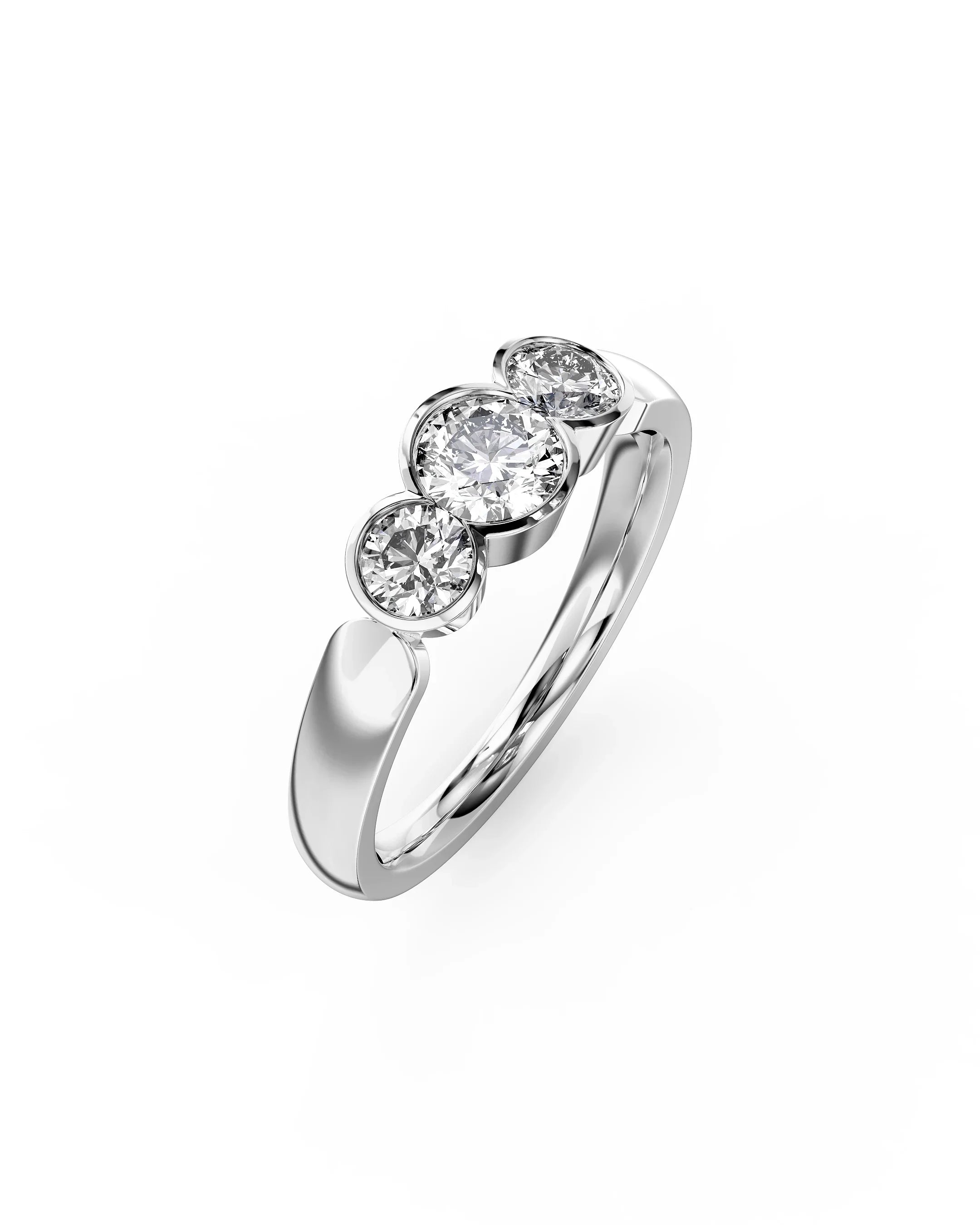 White gold trilogy engagement ring with three round cut diamonds.