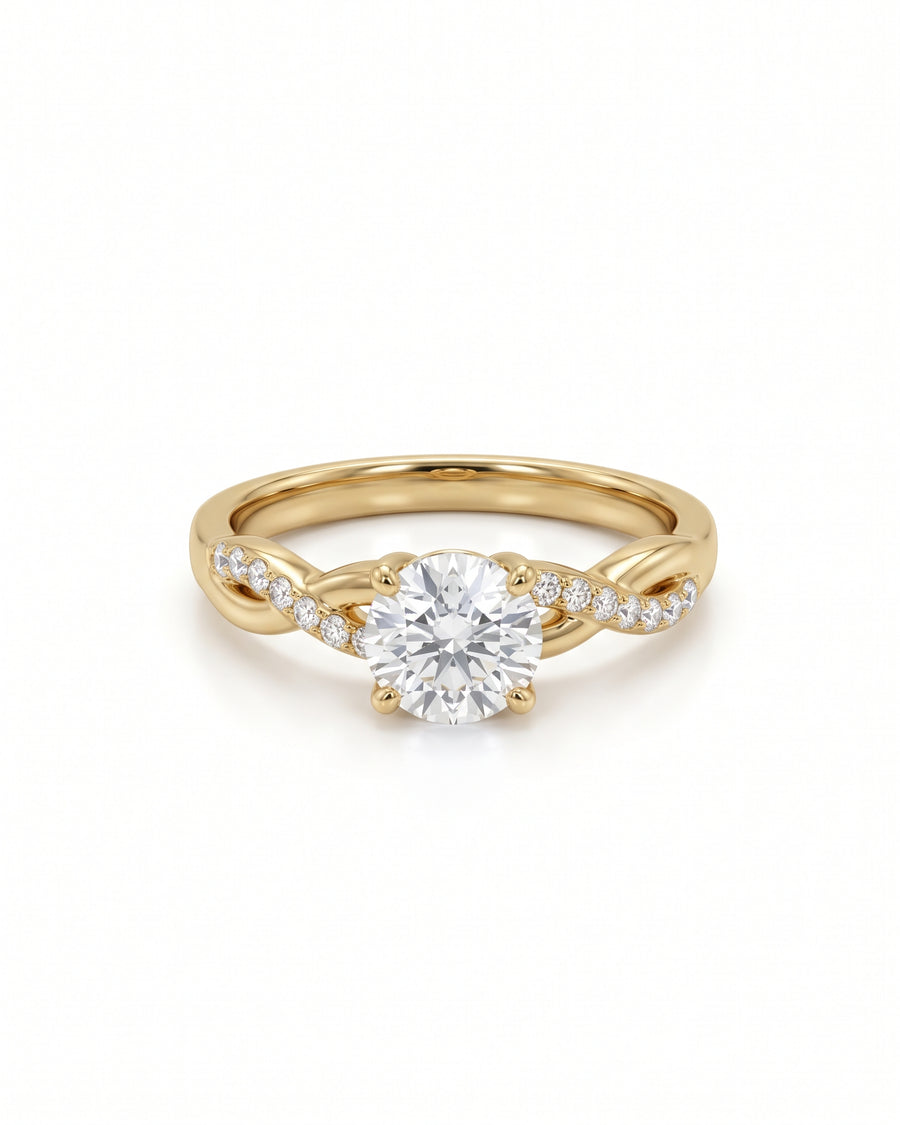 Round cut diamond engagement ring in 9ct yellow gold with a twisted band and claw setting.