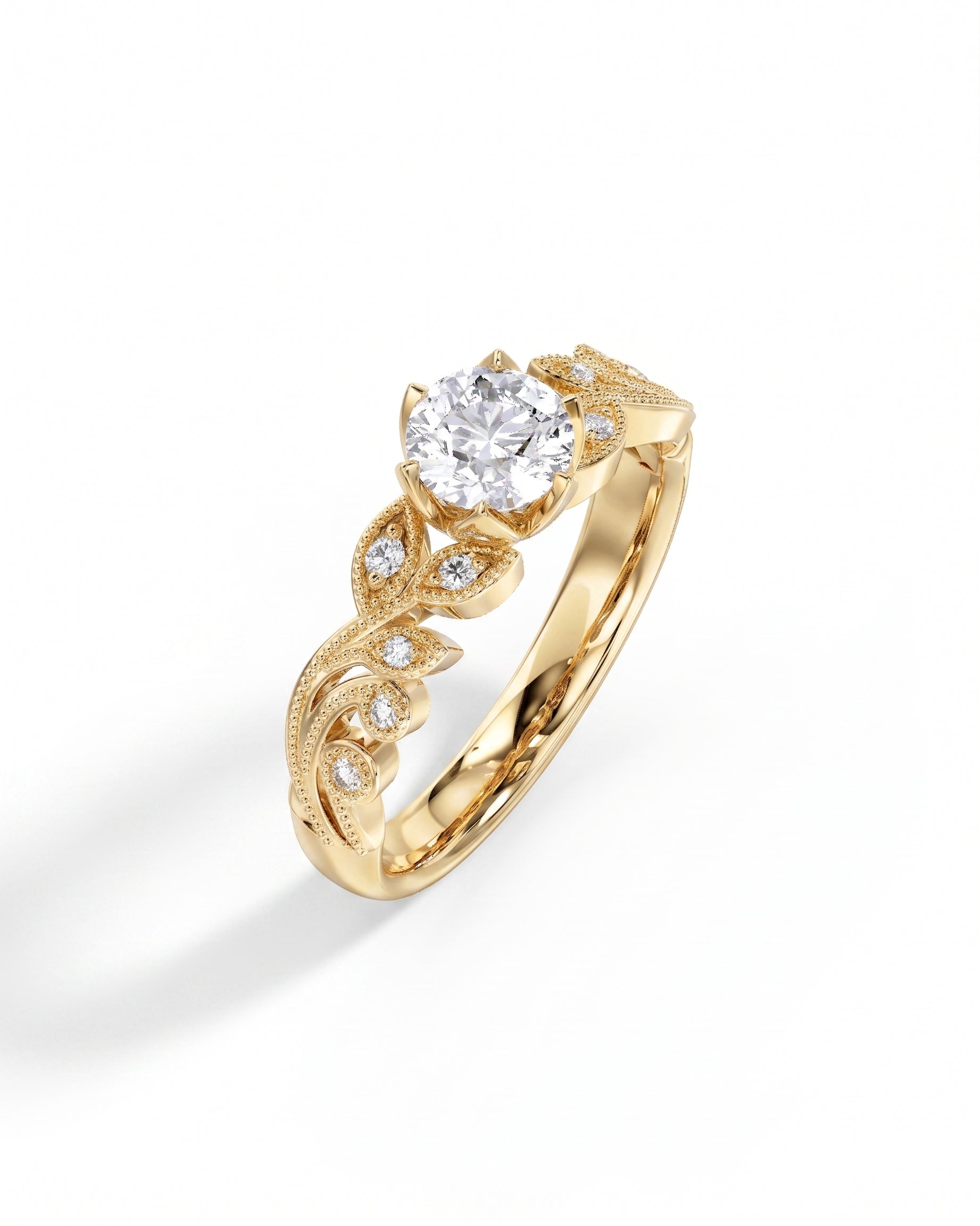 Gold vintage engagement ring with a round diamond and leaf-shaped accents.
