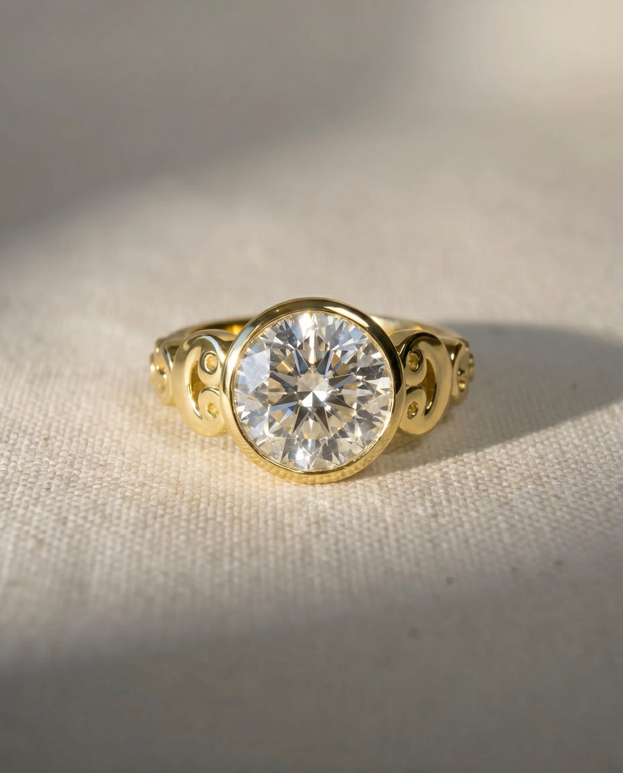 9ct yellow gold rub over diamond engagement ring with decorative band.