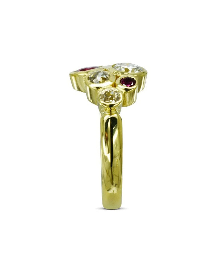Gold cluster ring with ruby and diamond gemstones.