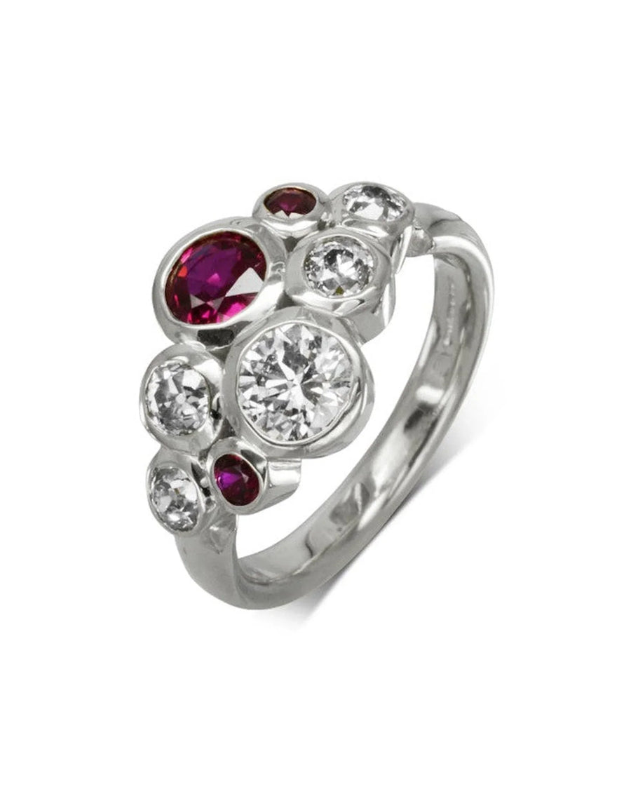 Platinum cluster ring with ruby and diamond gemstones.