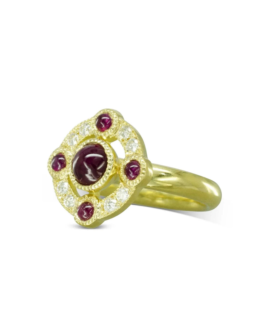 Medieval-inspired gold ring with ruby cabochons and diamond cluster detailing