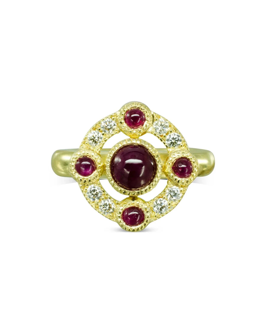 Gold cluster ring with round cabochon rubies and diamonds in a medieval-inspired design