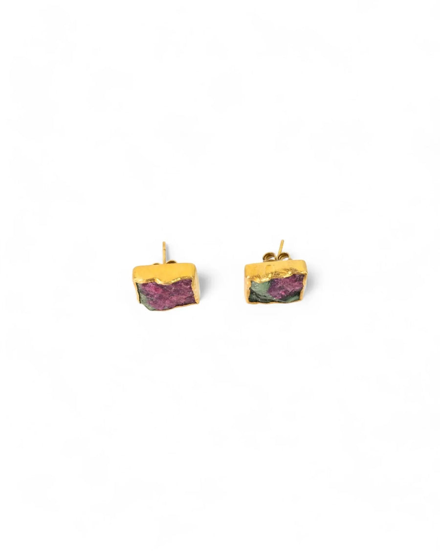 Gold square stud earrings with raw ruby zoisite stones on a white background