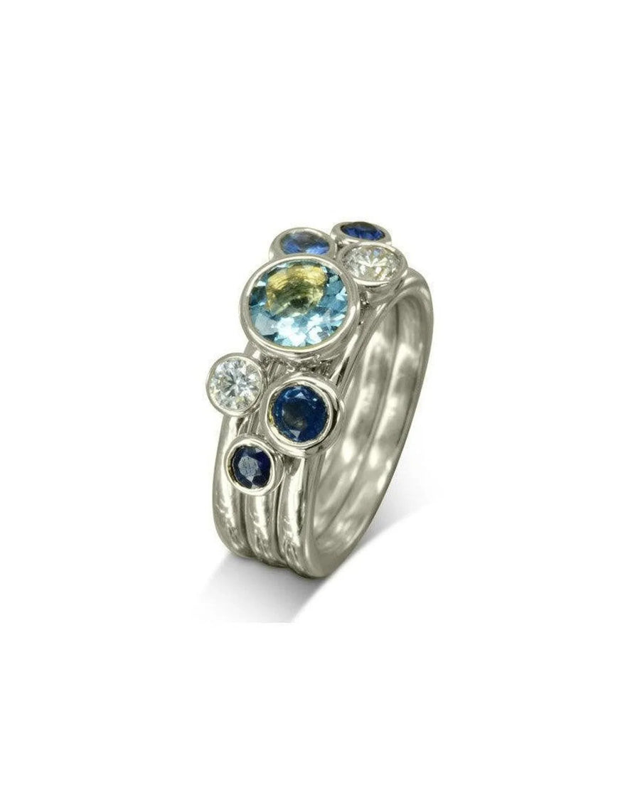 9ct white gold stacking ring set with sapphire, aquamarine, and diamond gemstones.