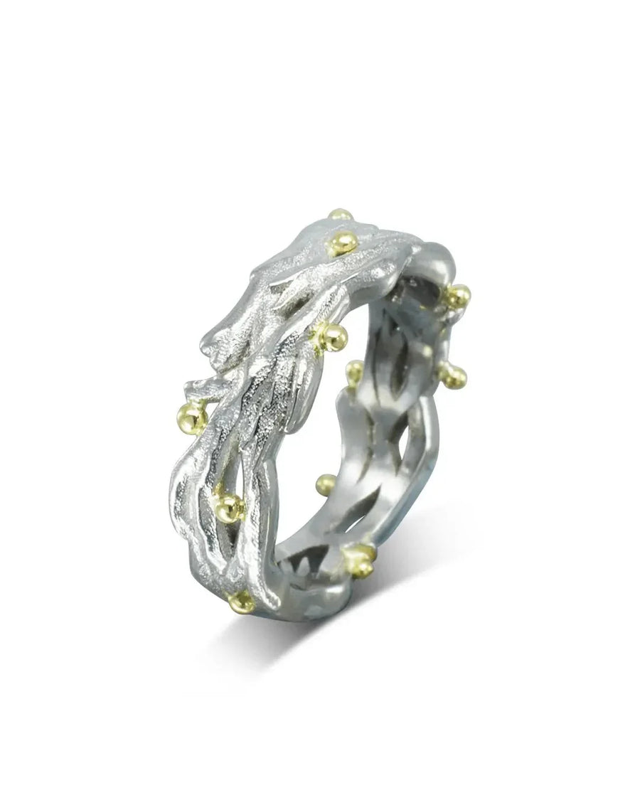 organic seaweed-inspired ring in white gold or platinum with yellow gold accents