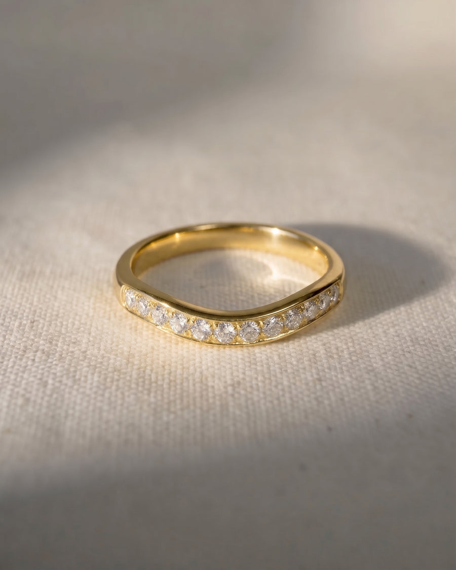 18ct yellow gold shaped pave set diamond ring.