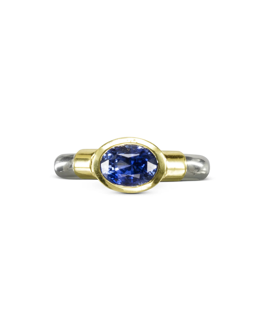 Handmade gold and silver ring with large oval blue sapphire gemstone