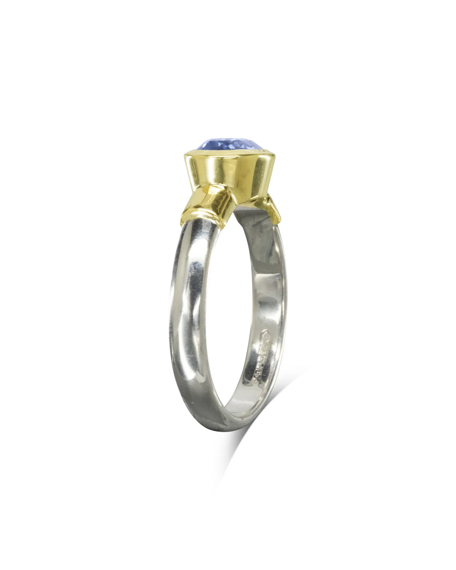 Handcrafted gold and silver ring with a large blue sapphire gemstone, luxury jewellery design