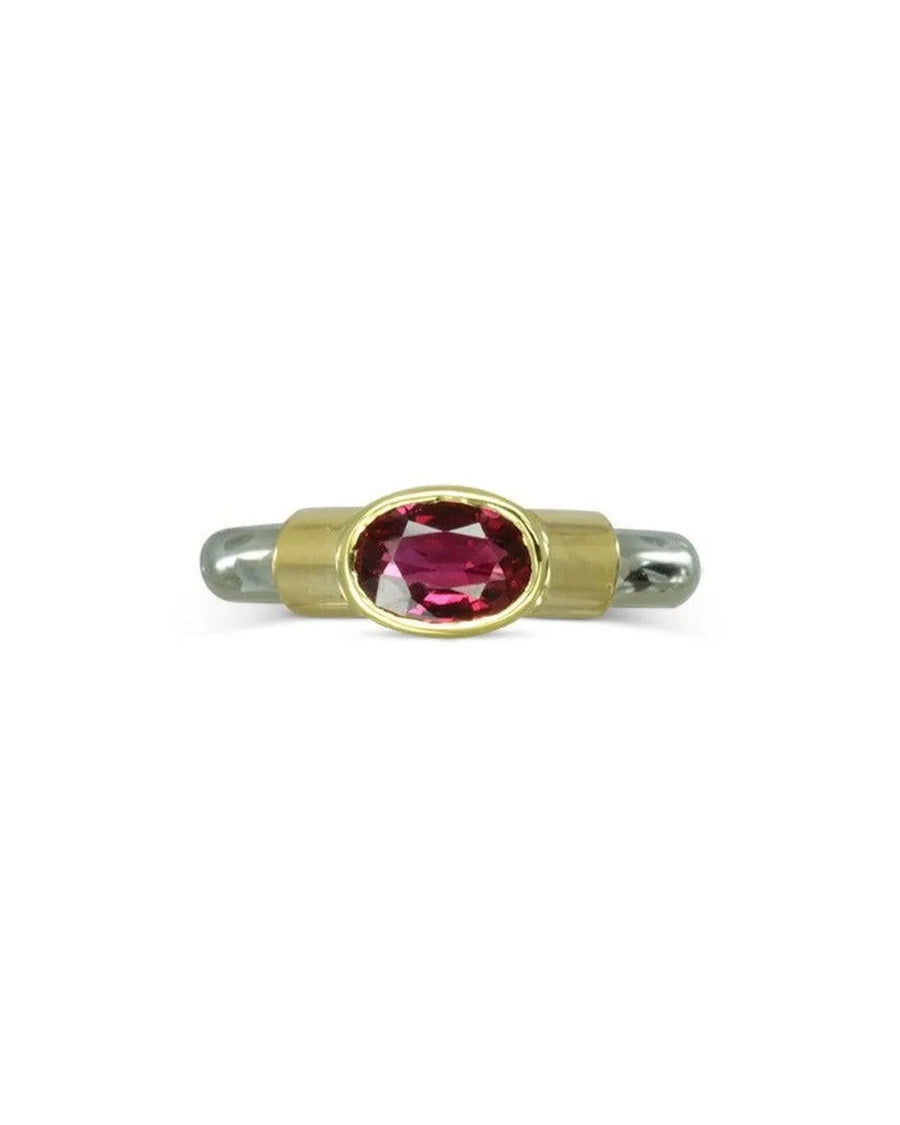 Gold and silver ring with an oval ruby solitaire.