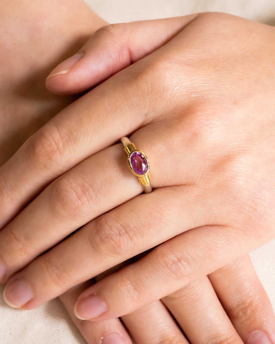 Gold and silver ring with an oval ruby solitaire.